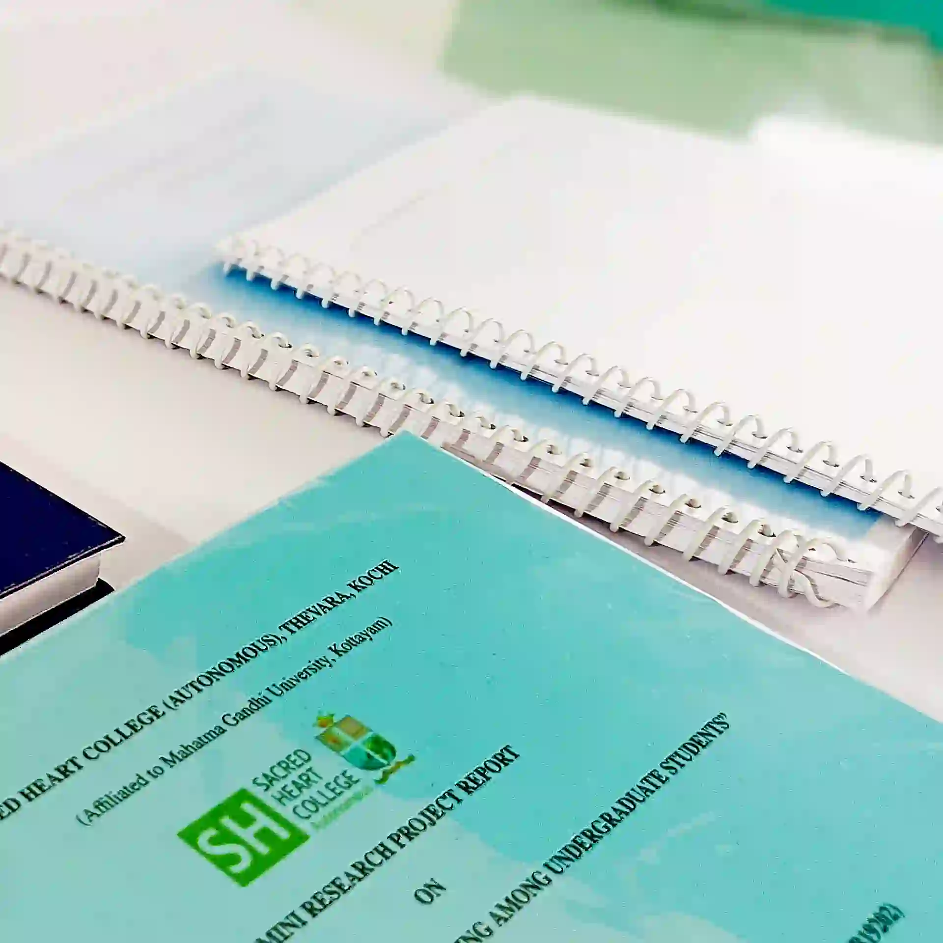 Professional book binding services Kochi - hardcover, paperback, spiral binding for students and publishers